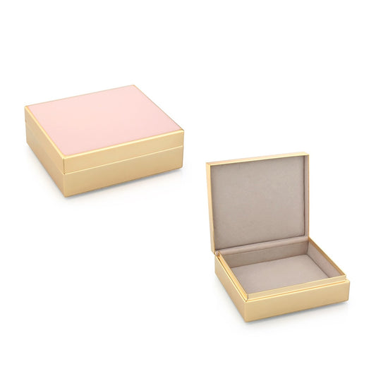 Smalto rosa pallido e scatola dorata